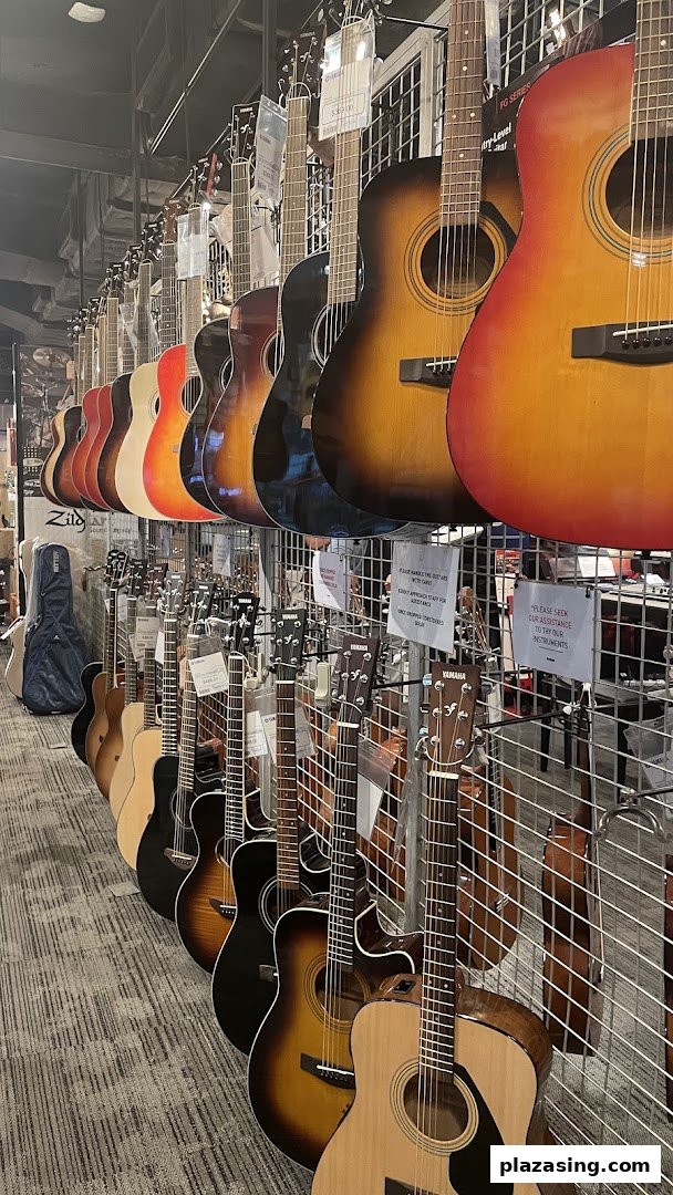 A vibrant display of acoustic guitars lined up for sale in a music store.