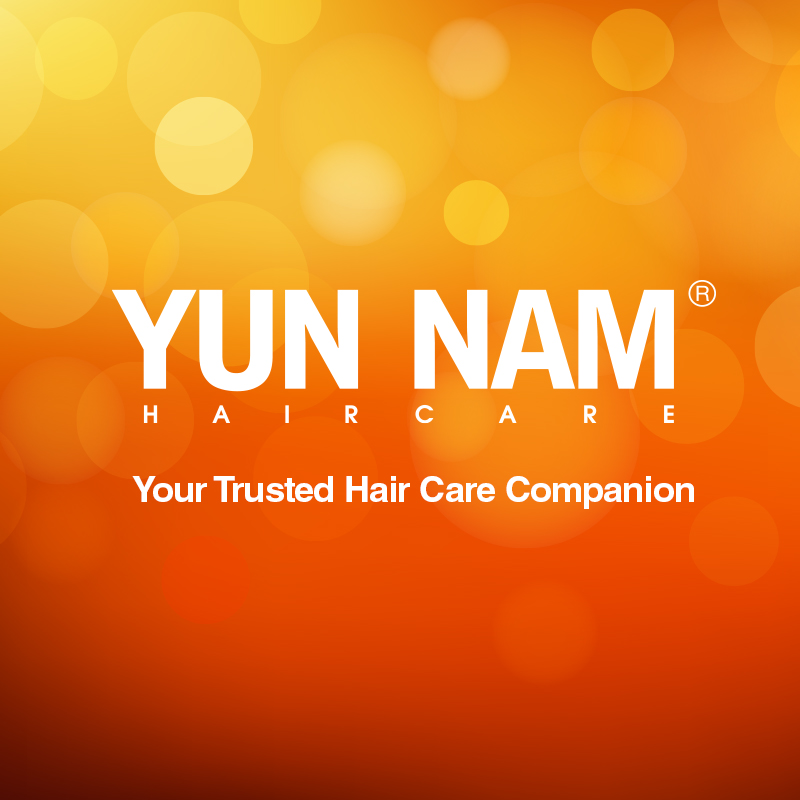 The Yun Nam Hair Care logo and slogan 'Your Trusted Hair Care Companion' on an orange background.