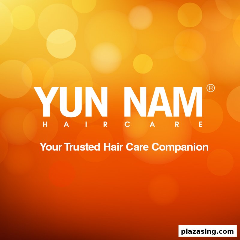 The Yun Nam Hair Care logo and slogan 'Your Trusted Hair Care Companion' on an orange background.
