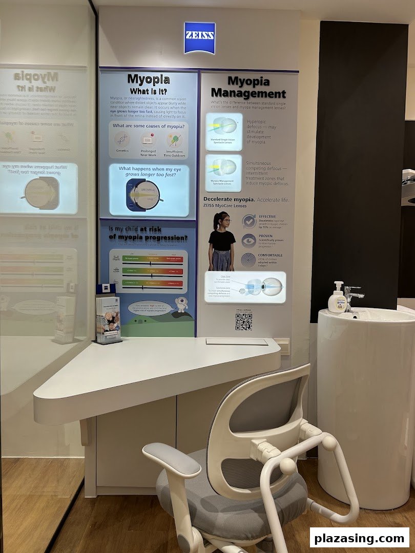 An interior shot of an optometrist's office featuring a detailed ZEISS display on myopia and its management.