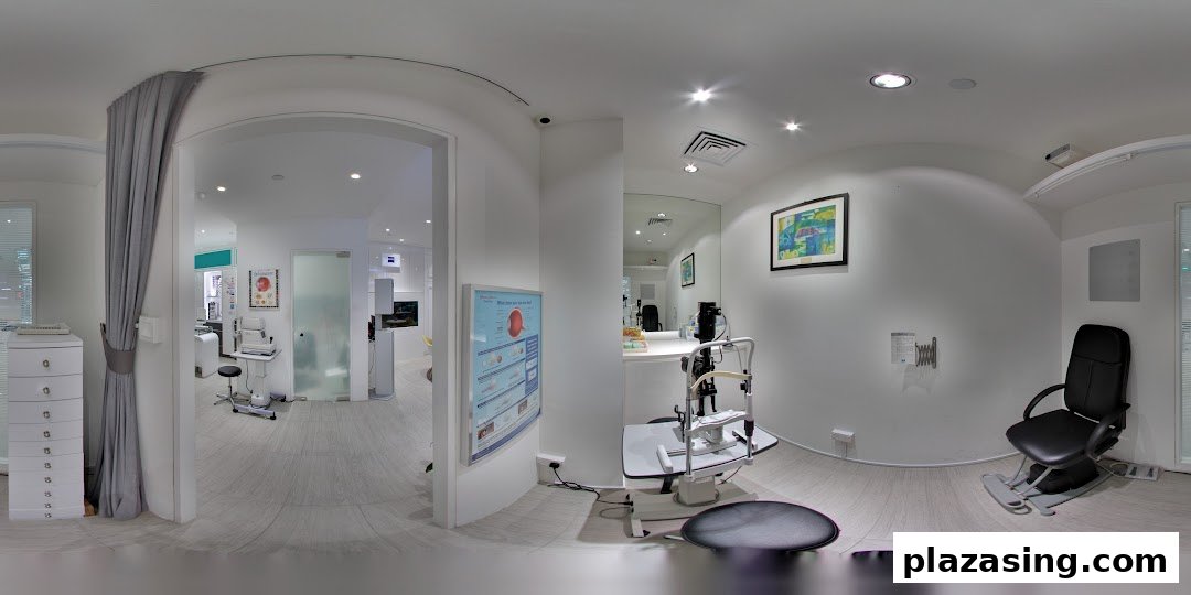 An interior view of ZEISS VISION CENTER by KJ Optometrists, showcasing modern eye examination equipment and a clean environment.