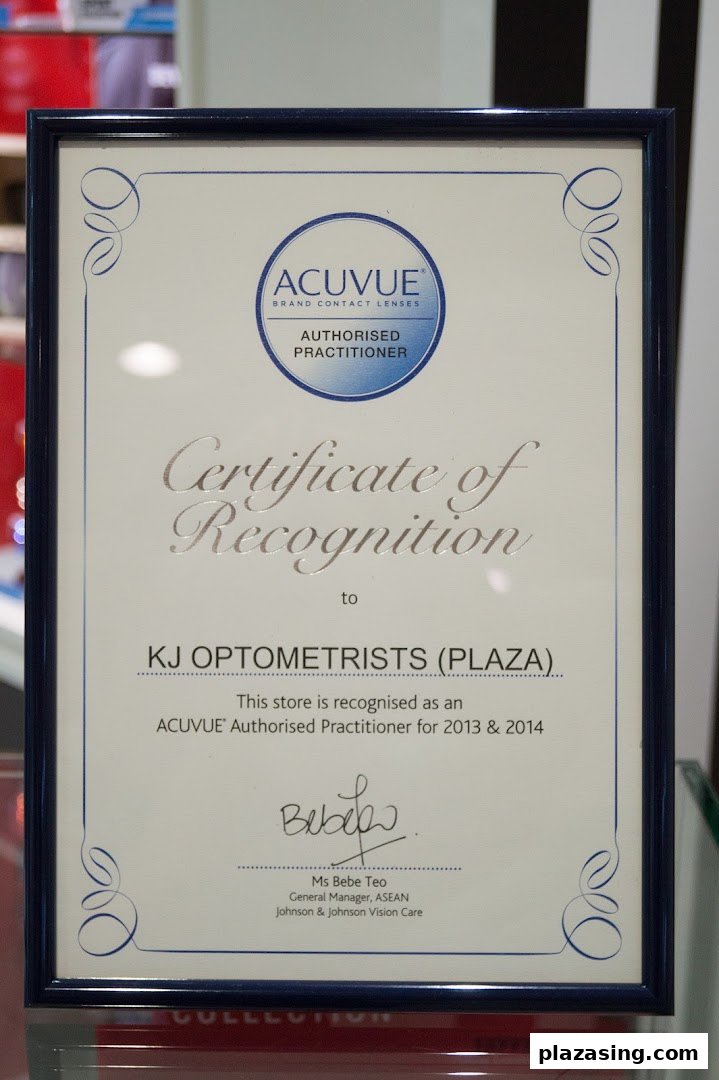 A framed certificate recognizing KJ Optometrists as an ACUVUE® Authorized Practitioner.