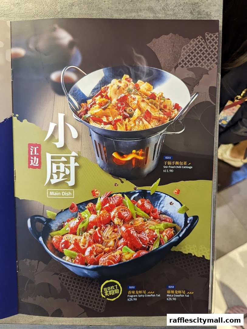 A menu featuring two popular Chinese dishes: stir-fried chili cabbage and spicy crawfish tails.