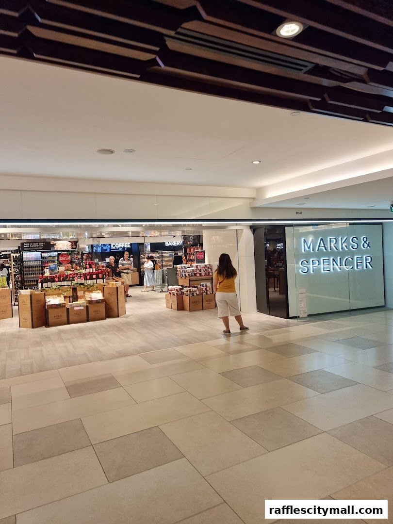 Marks & Spencer shop entrance with displays of food and bakery items.
