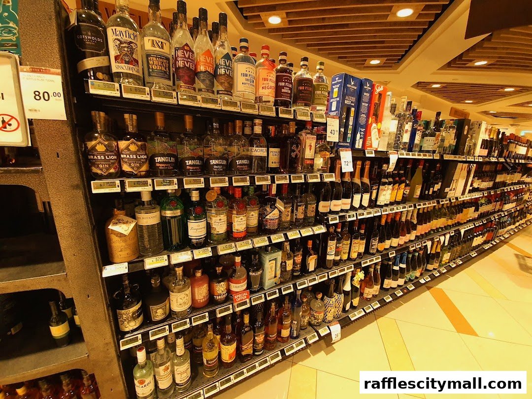 A wide selection of alcoholic beverages, including spirits and wines, displayed on shelves in a retail store.