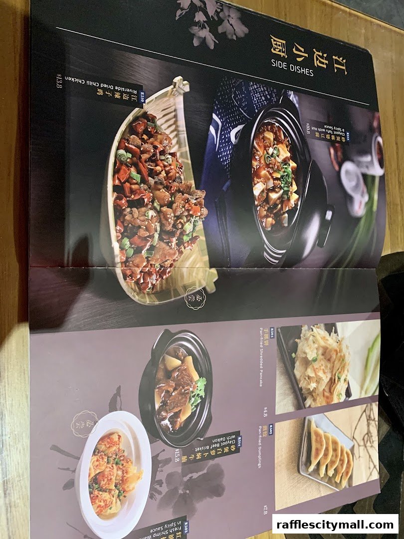 A menu page showcasing various Chinese side dishes with appealing food photography.