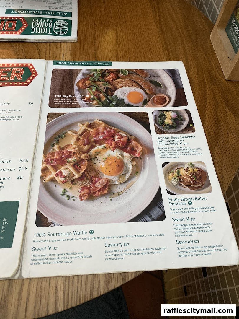 A menu from Tiong Bahru Bakery featuring breakfast and brunch items like waffles and pancakes.