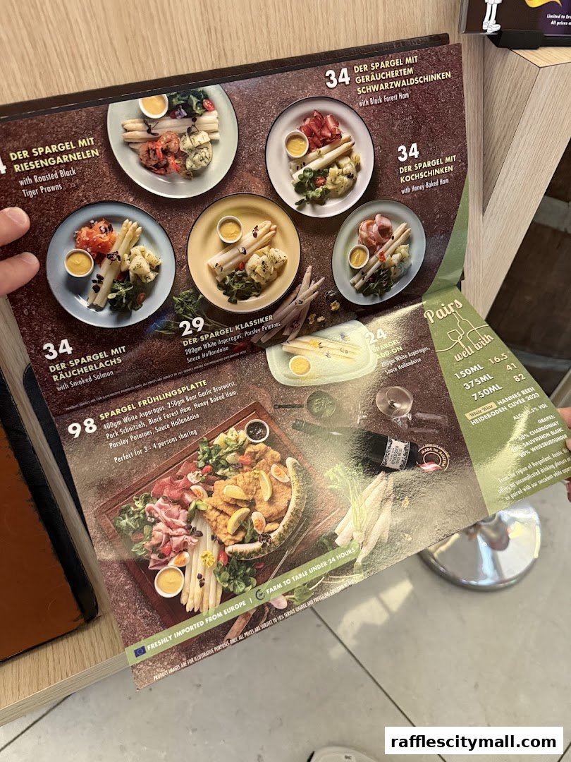 A menu featuring various asparagus dishes and wine pairings.
