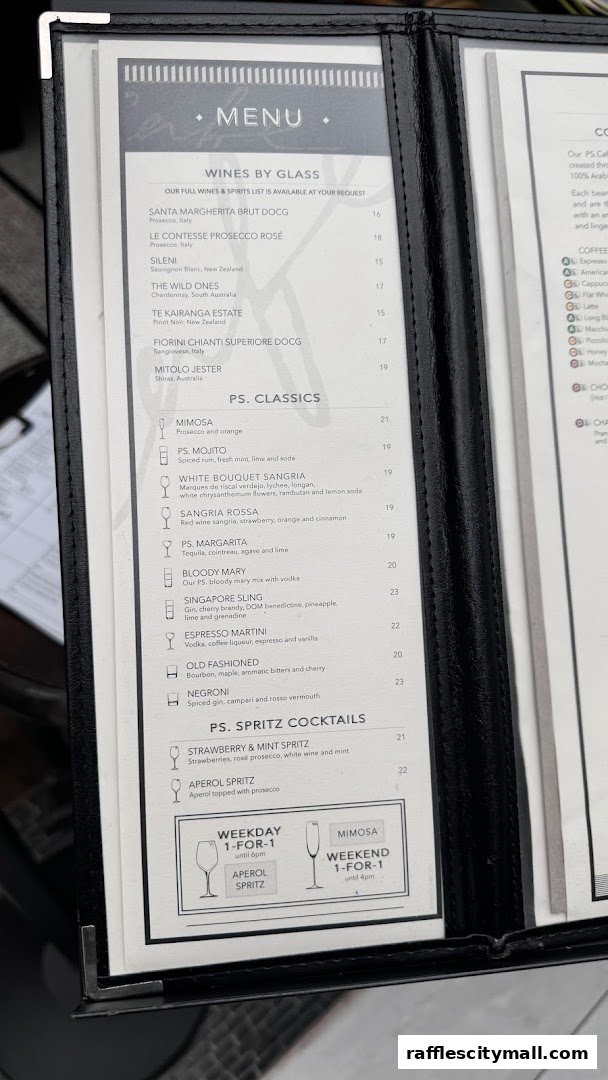 A menu from PS.Cafe Raffles City featuring wines, cocktails, and special offers.