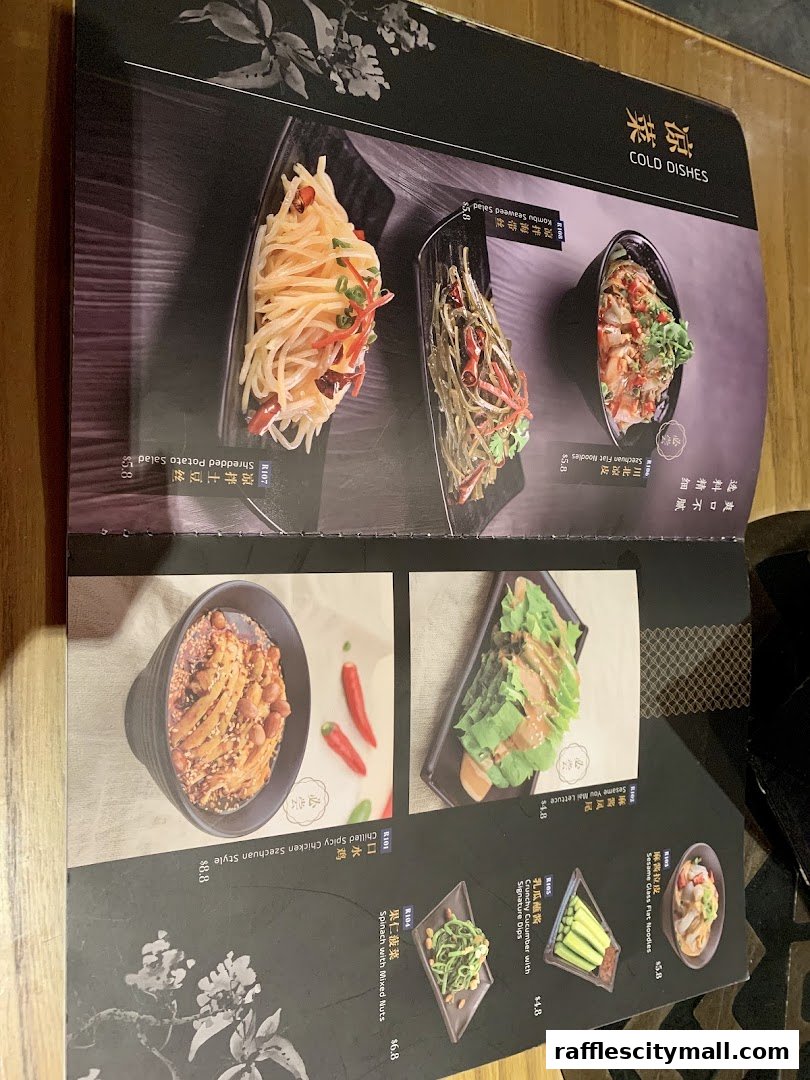 A menu page showcasing various cold dishes with appealing food photography.