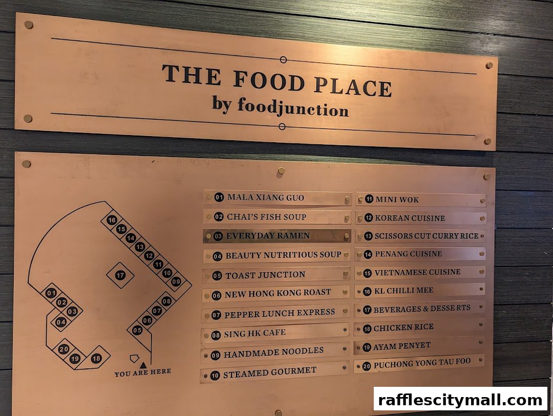 A sign displaying various food stalls and a map at The Food Place by Foodjunction.