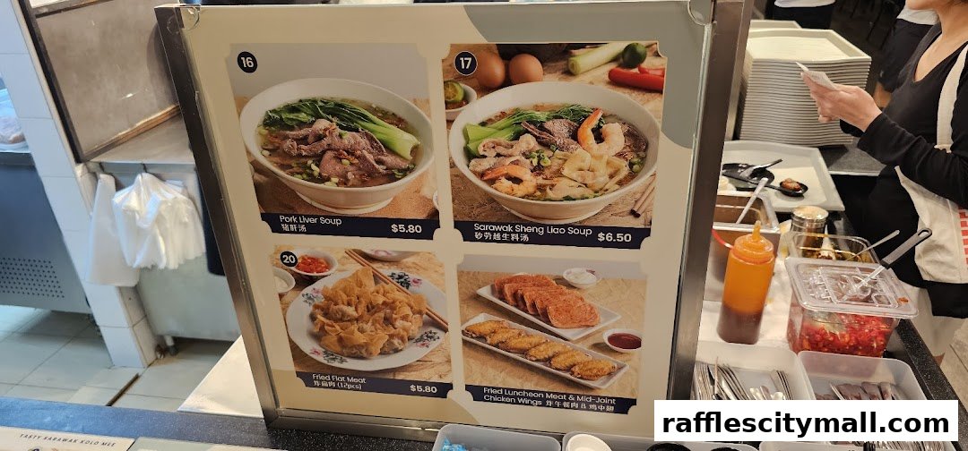 A menu board displaying four different food items with images and prices.