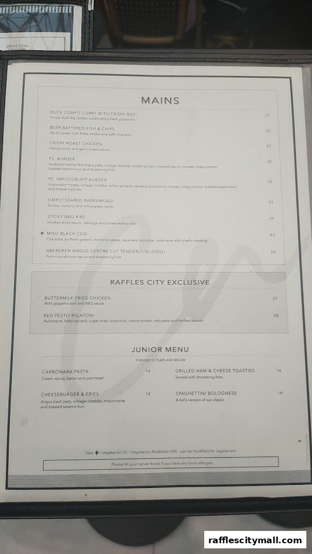 A menu from PS.Cafe Raffles City featuring mains, exclusive dishes, and a junior menu.