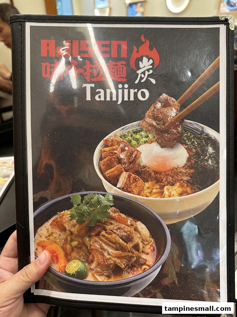A menu page for Ajisen Tanjiro, showcasing two appetizing ramen dishes.