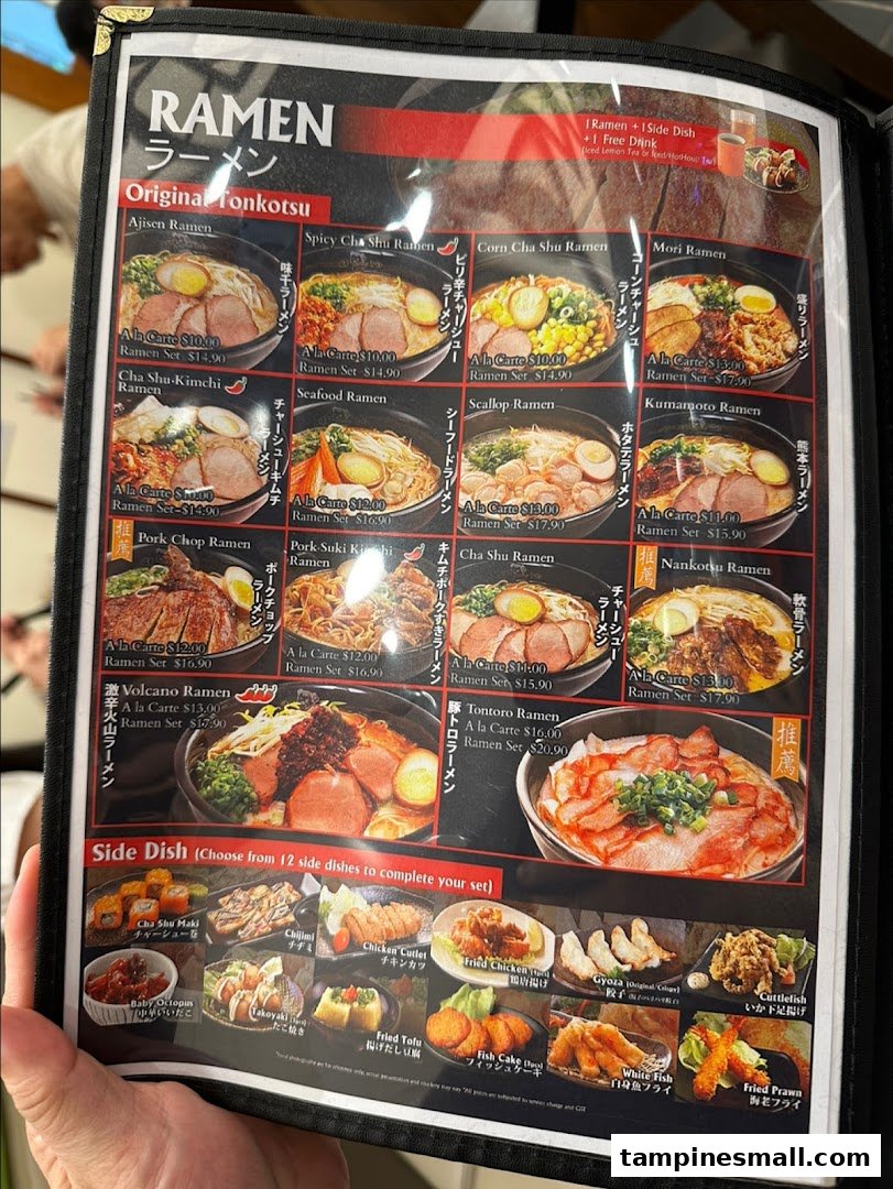 A detailed menu displaying various ramen dishes and side options from Ajisen Tanjiro.