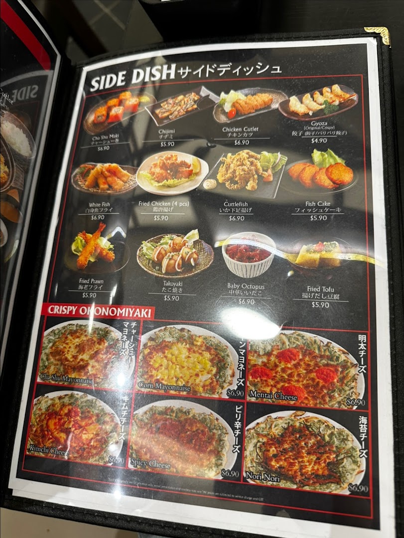 A detailed menu page showcasing side dishes and crispy okonomiyaki options with prices.
