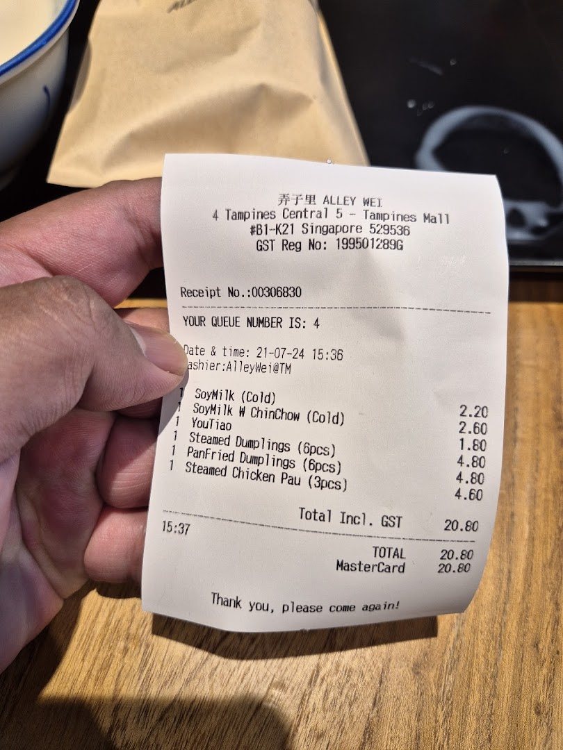 A customer's receipt from Alley Wei, detailing a purchase of drinks and dim sum items.