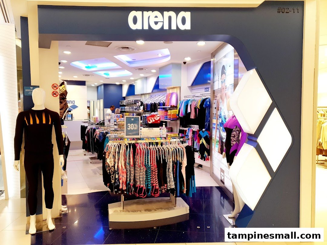 The entrance of the Arena sportswear shop, showcasing activewear and swimwear with a 30% off promotion.