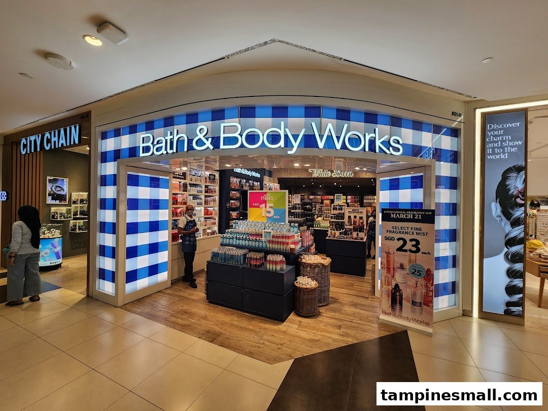 The vibrant blue and white checkered facade of Bath & Body Works at Tampines Mall.