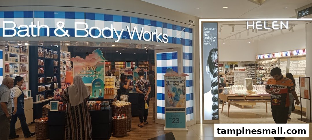The vibrant storefront of Bath & Body Works, featuring its signature blue and white checkered pattern, alongside another shop.