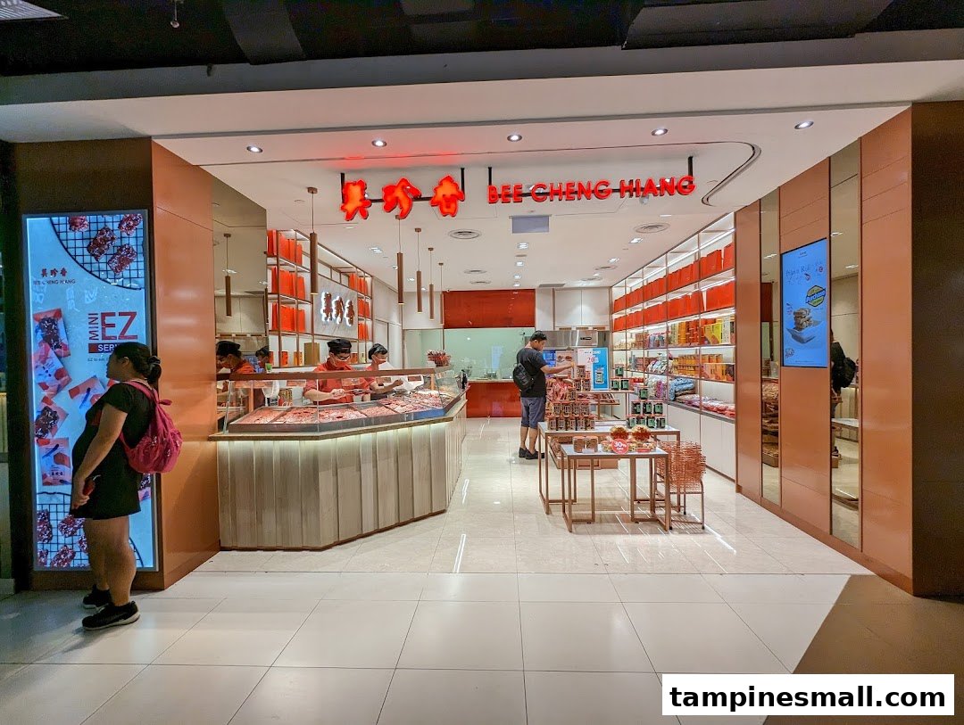The Bee Cheng Hiang shop front features a bright interior, display counters, and staff serving customers.