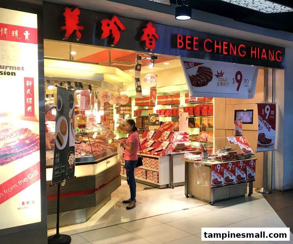 A vibrant shop front of Bee Cheng Hiang, showcasing bak kwa and other traditional Chinese delicacies.