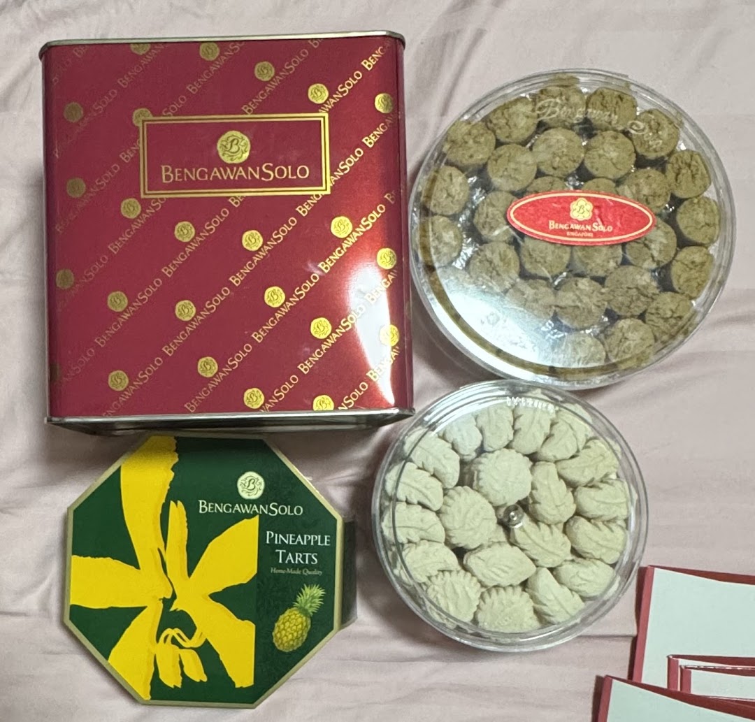 A collection of packaged cookies and pineapple tarts from Bengawan Solo, showcasing their delicious offerings.