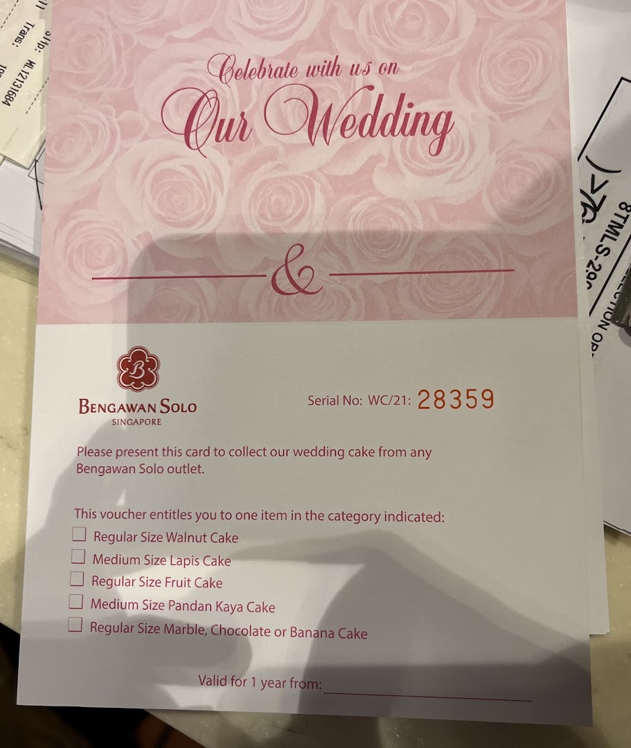 A Bengawan Solo wedding cake voucher displaying various cake options for collection.