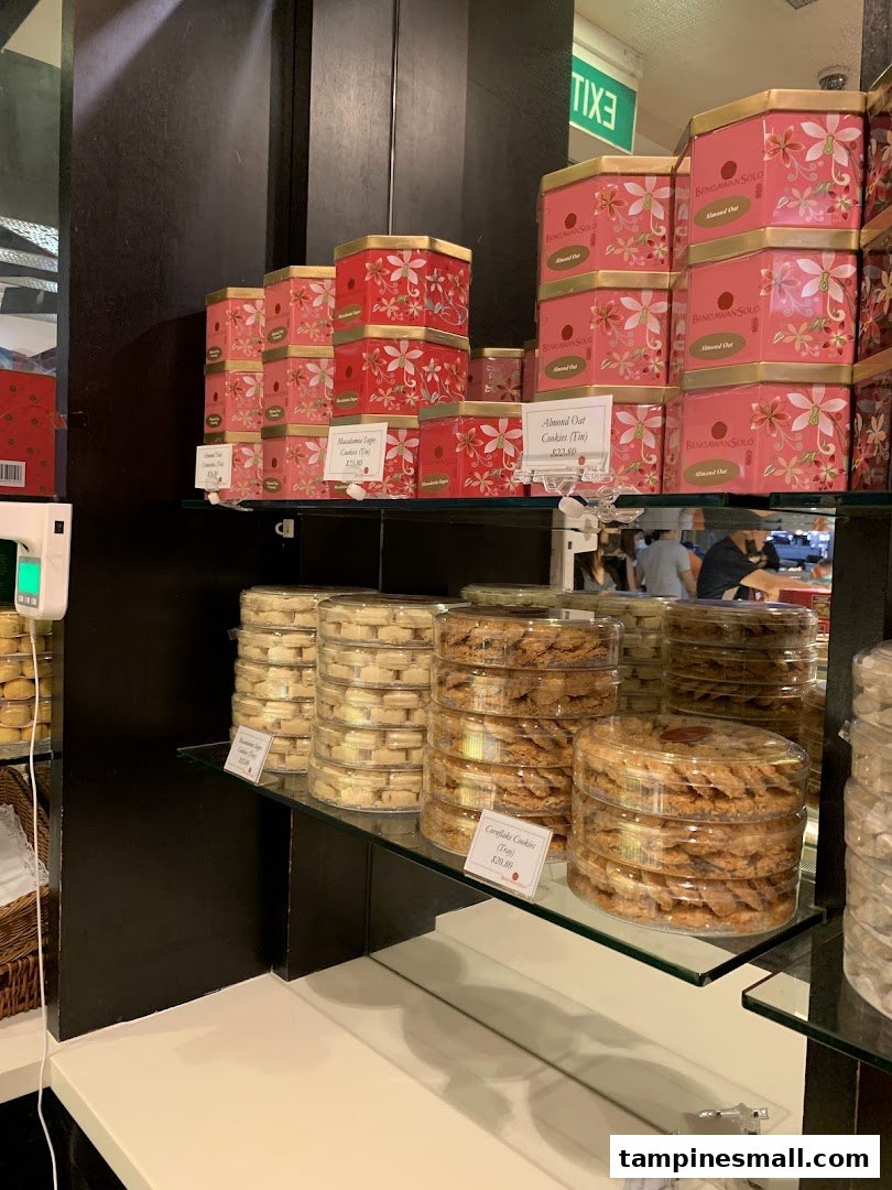 Shelves filled with beautifully packaged cookies and pastries, showcasing Bengawan Solo's delicious offerings.