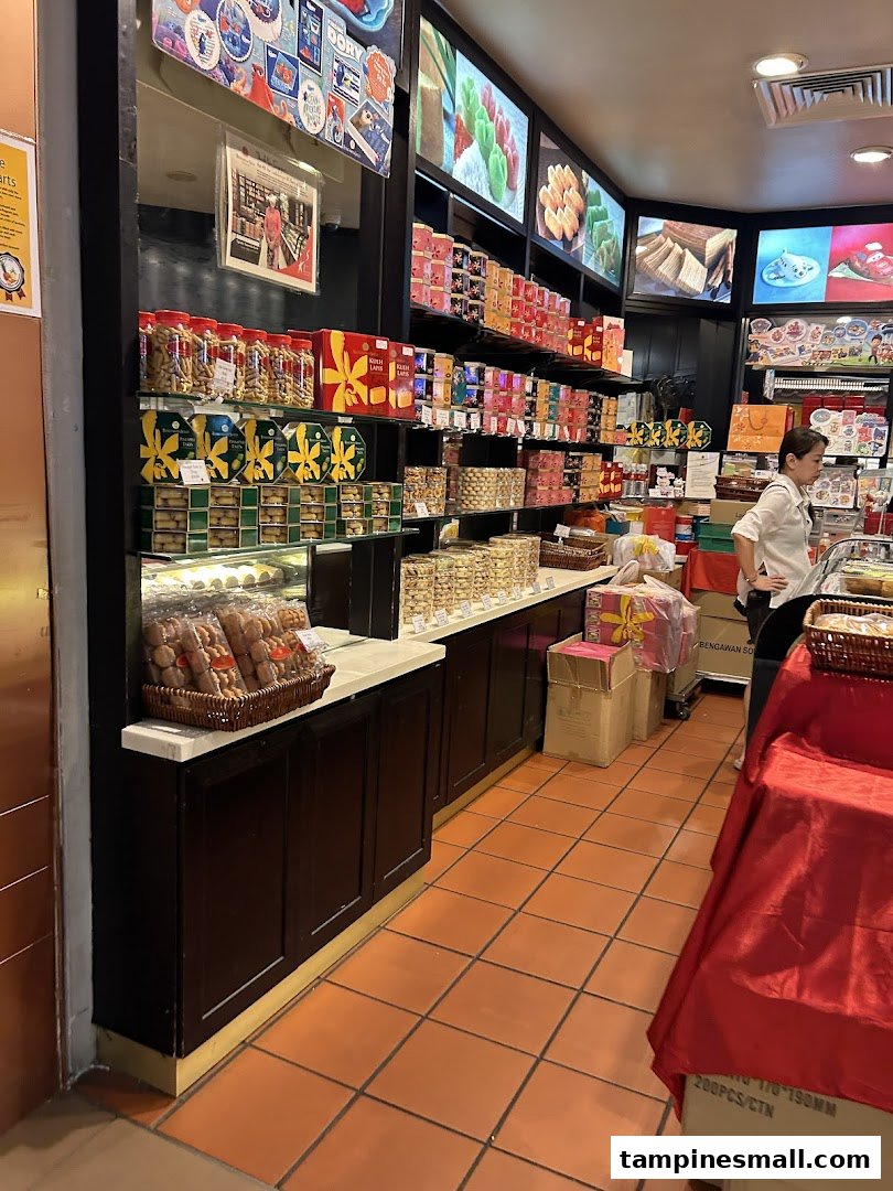 Interior view of Bengawan Solo, showcasing shelves packed with traditional Indonesian snacks and pastries.