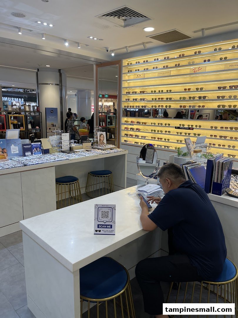 Interior view of Better Vision optical shop, showcasing eyewear displays and a customer.
