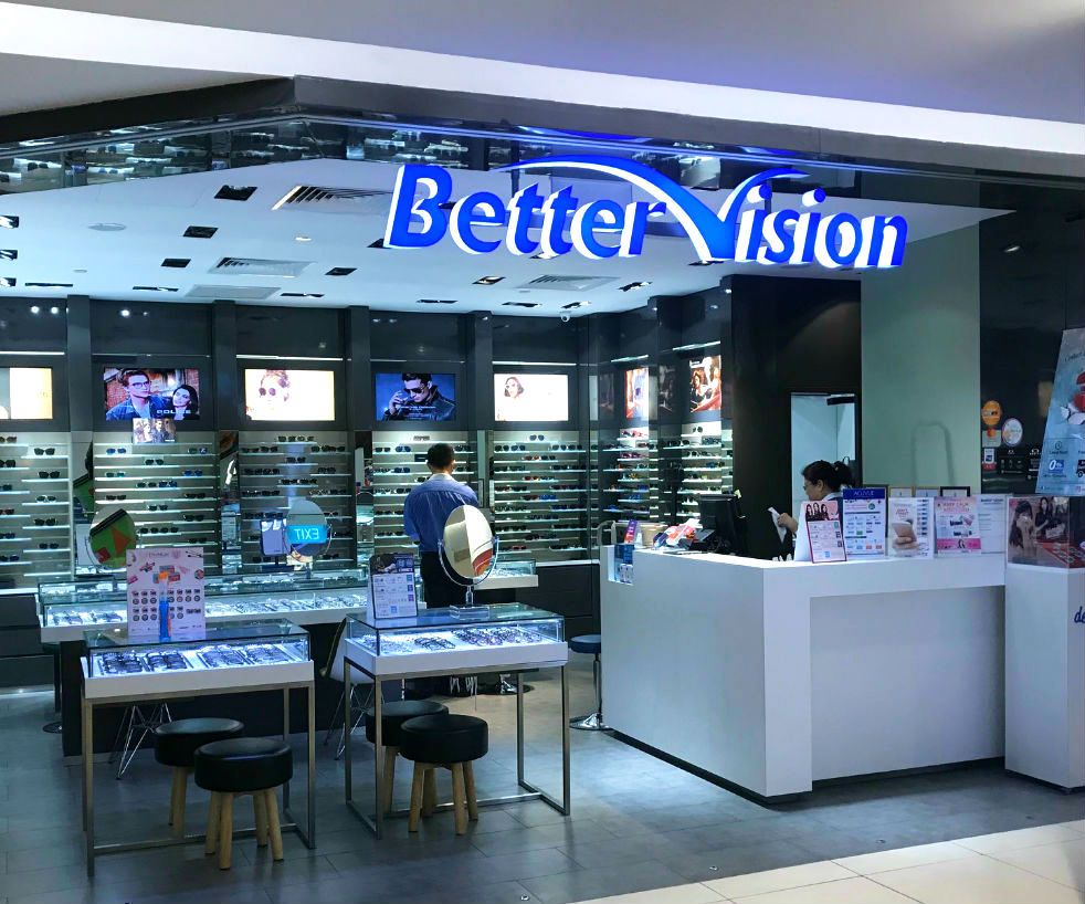 The brightly lit Better Vision shop entrance showcases a wide selection of eyewear and a welcoming counter.