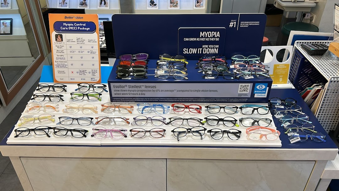A display of eyeglasses and a detailed 'Myopia Control Care' package price list at Better Vision.