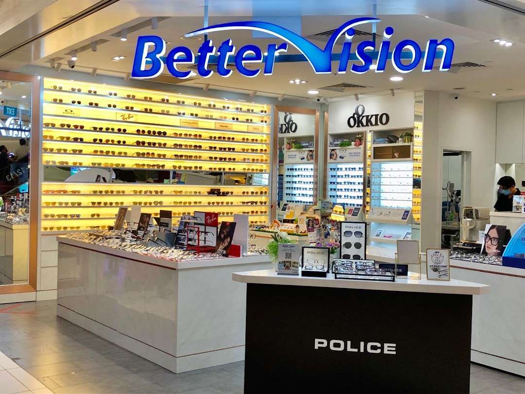 Brightly lit entrance of Better Vision optical shop showcasing a wide array of eyewear and sunglasses.
