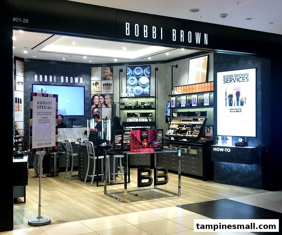 An inviting interior view of the Bobbi Brown cosmetics store, showcasing makeup displays, service counters, and branding.