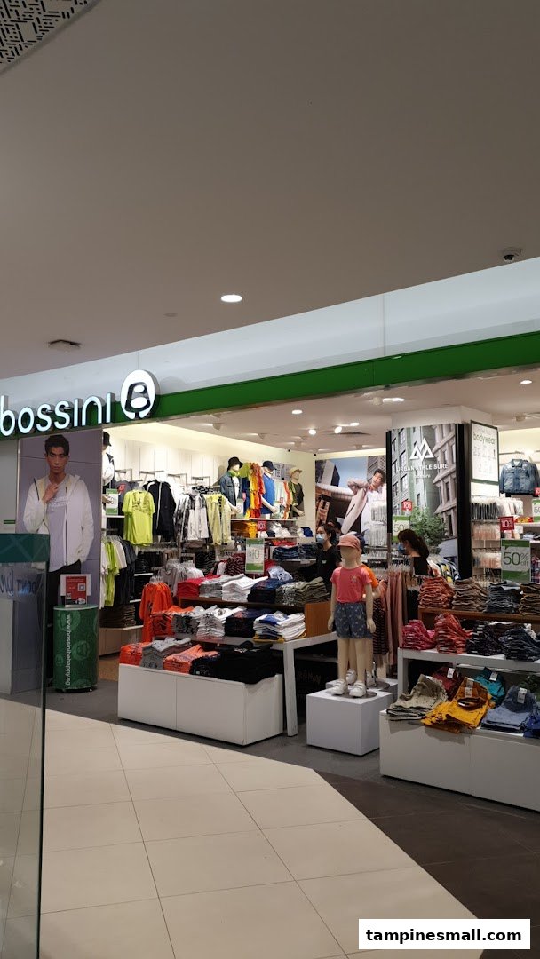 The Bossini shop front at Tampines Mall, showcasing a wide array of casual apparel and mannequins.