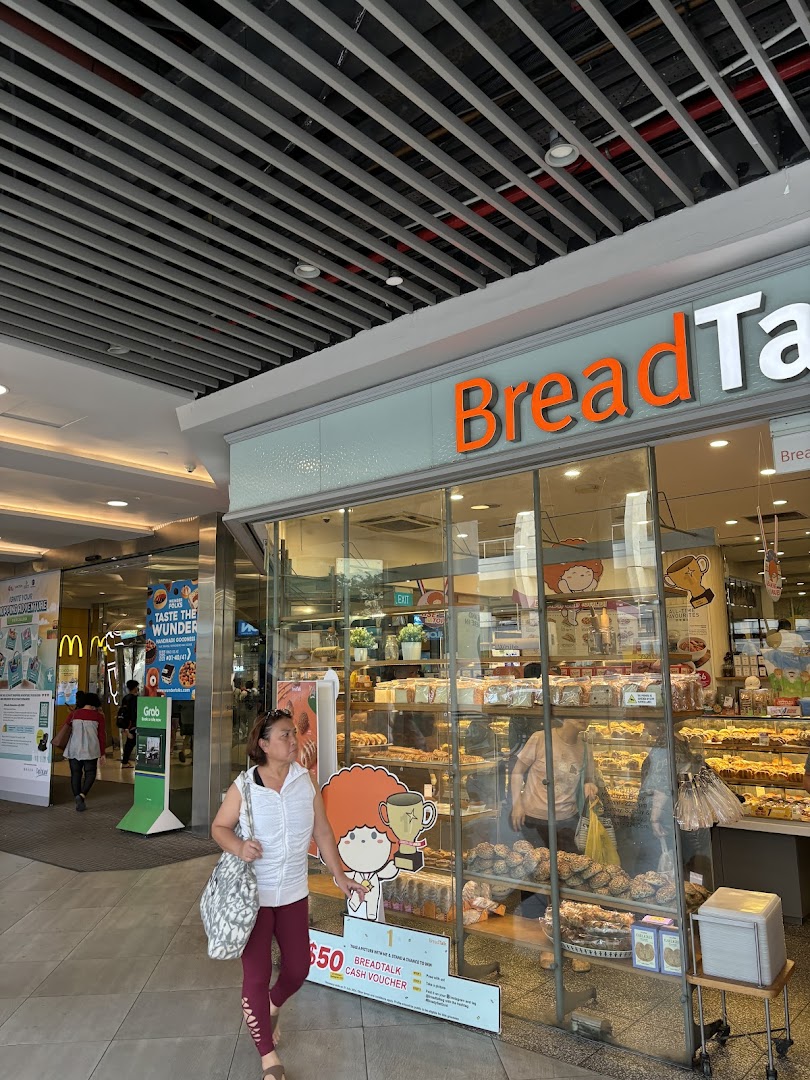 The storefront of BreadTalk bakery showcasing a wide array of freshly baked goods.