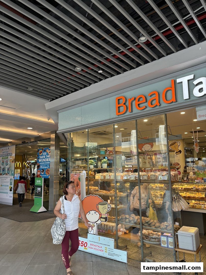 The storefront of BreadTalk bakery showcasing a wide array of freshly baked goods.