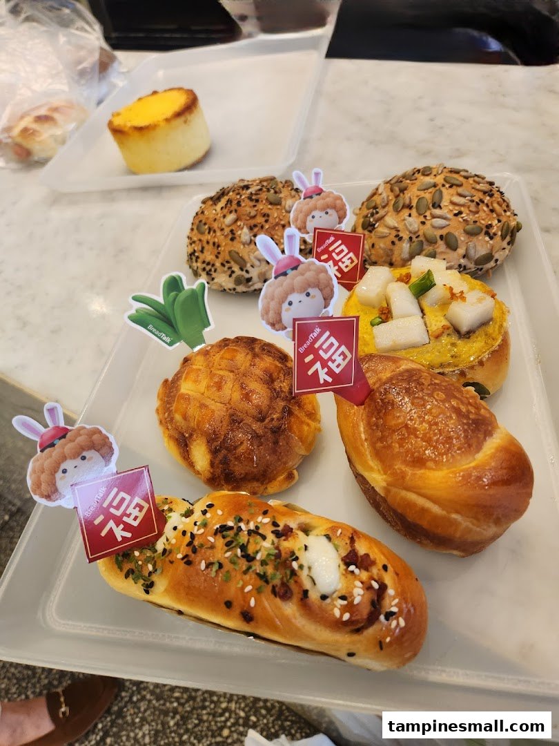 A variety of freshly baked buns and pastries from BreadTalk on display.