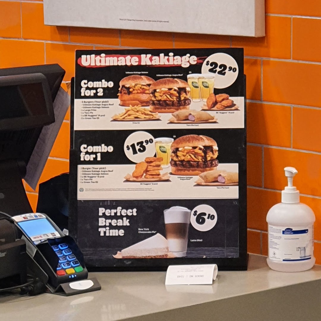A Burger King menu board displaying Ultimate Kakiage combos and a Perfect Break Time offer.