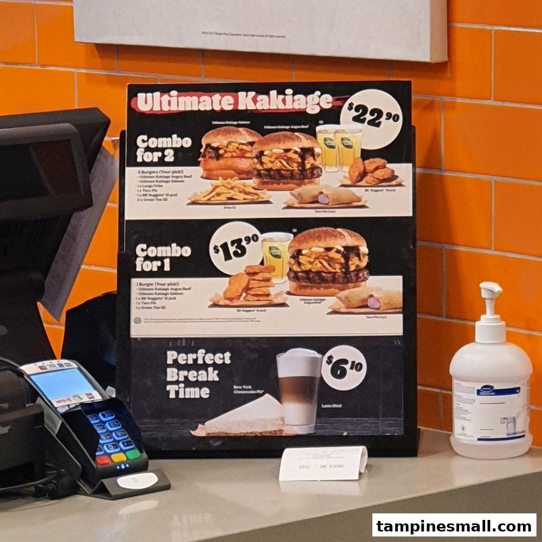 A Burger King menu board displaying Ultimate Kakiage combos and a Perfect Break Time offer.