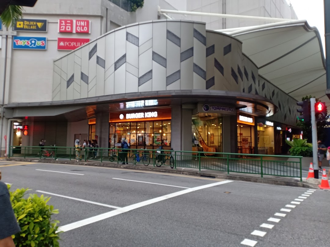 Exterior view of Burger King at Tampines Mall, showcasing its prominent storefront and surrounding mall environment.