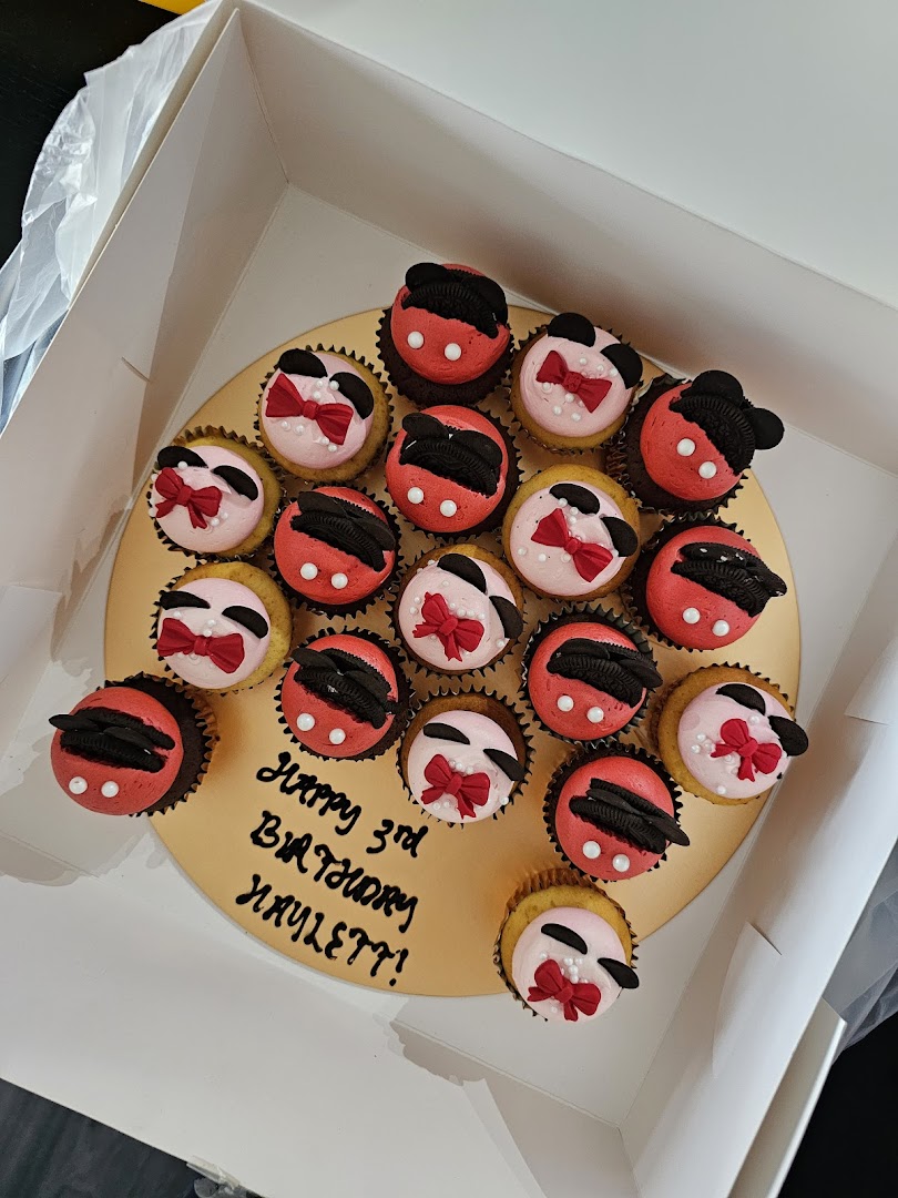 A collection of Mickey and Minnie Mouse themed cupcakes in a box with a 'Happy 3rd Birthday HAYLETT!' message.