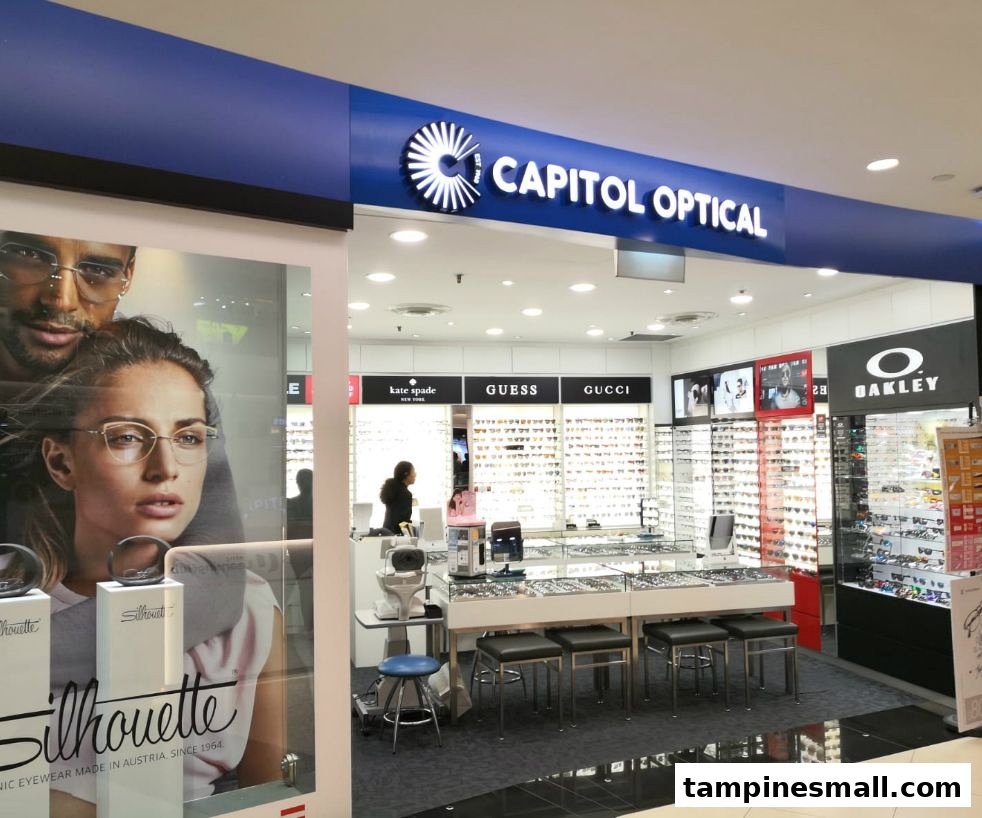 The shop front of Capitol Optical, showcasing a wide range of eyewear from brands like Kate Spade, Guess, Gucci, and Oakley.