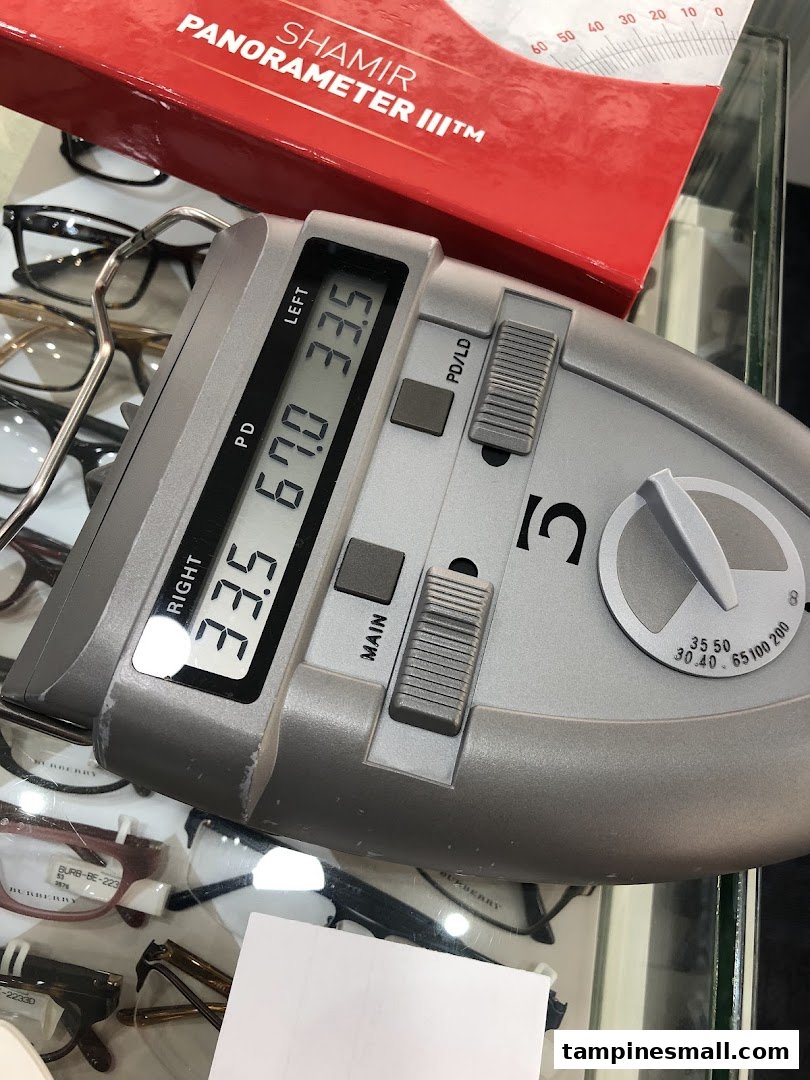 Close-up of an optical measurement device, Shamir Panorameter III, used for precise eye examinations.