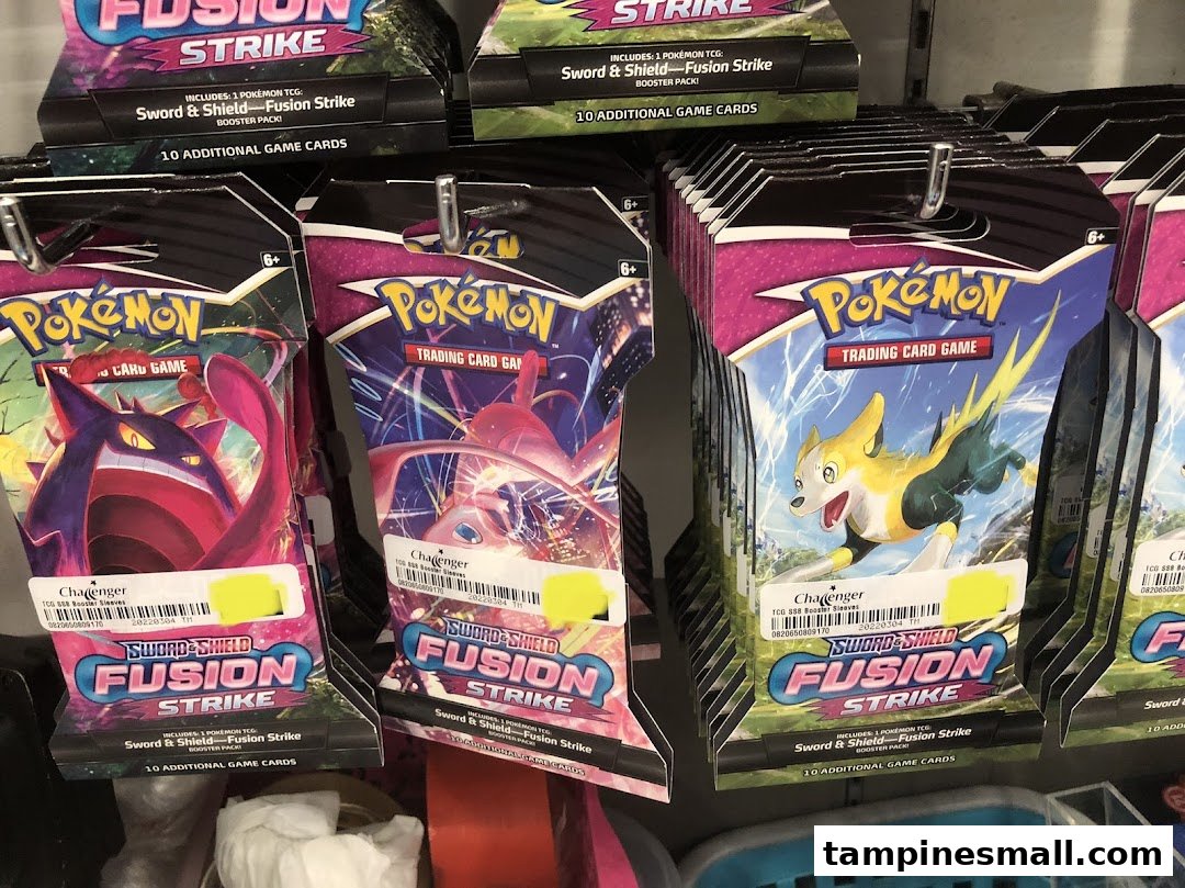 Close-up of Pokémon Trading Card Game: Fusion Strike booster packs displayed on a rack at Challenger.