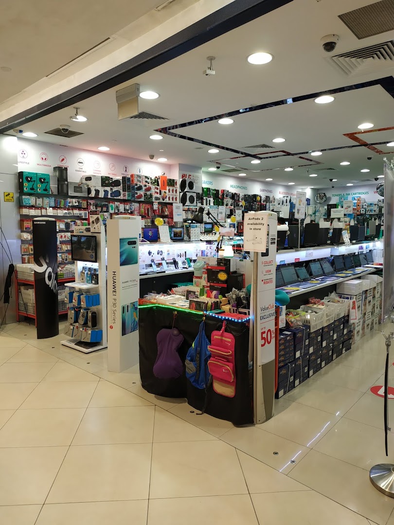Interior view of Challenger electronics store, showcasing a wide range of gadgets, accessories, and IT products.