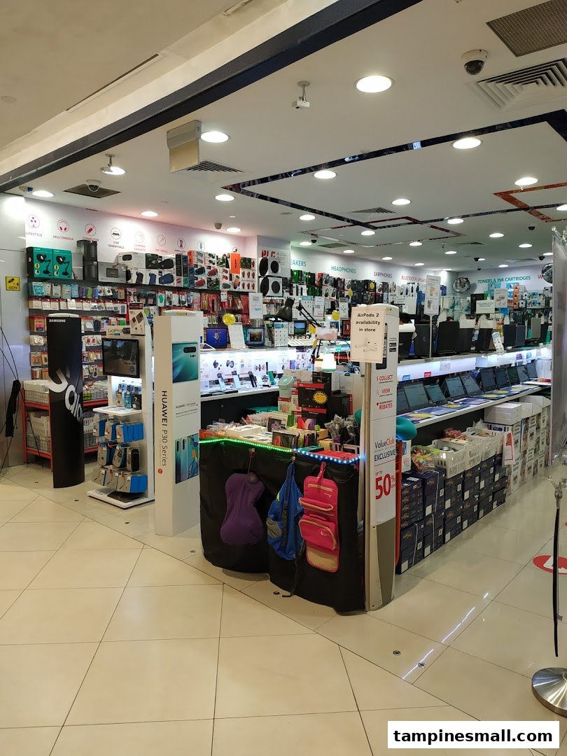 Interior view of Challenger electronics store, showcasing a wide range of gadgets, accessories, and IT products.