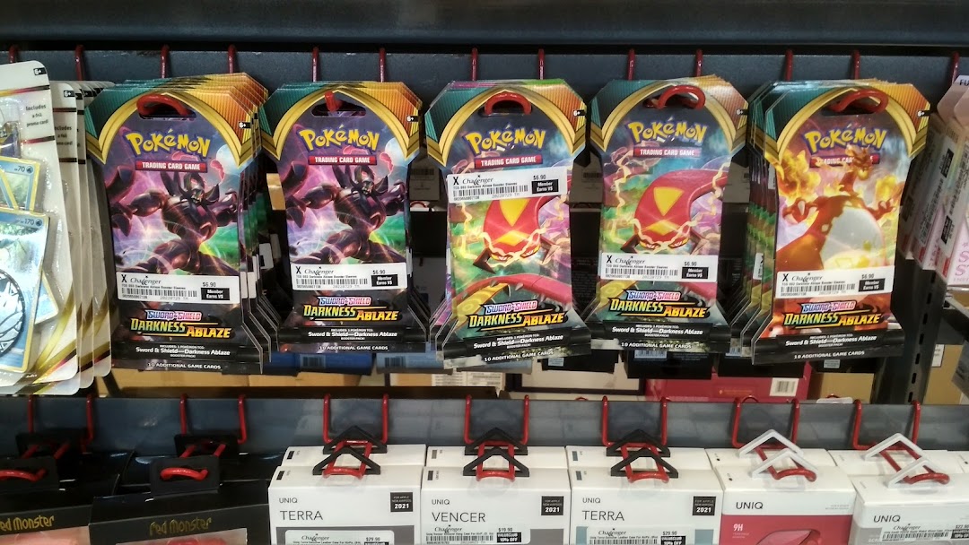 Close-up of Pokémon Trading Card Game booster packs, Sword & Shield Darkness Ablaze, displayed on a shelf at Challenger.