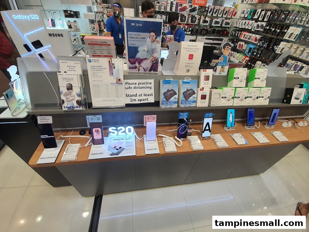 A vibrant display of Samsung Galaxy S20 phones and accessories inside Challenger electronics store.